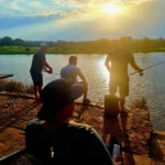 campsites and a caravan site people fishing