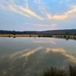 dam at imbabali in front of the cottages