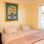 double bed in cottage two